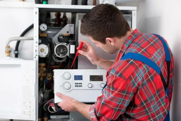 plumber-repairing-a-water-heater-in-chicagoland