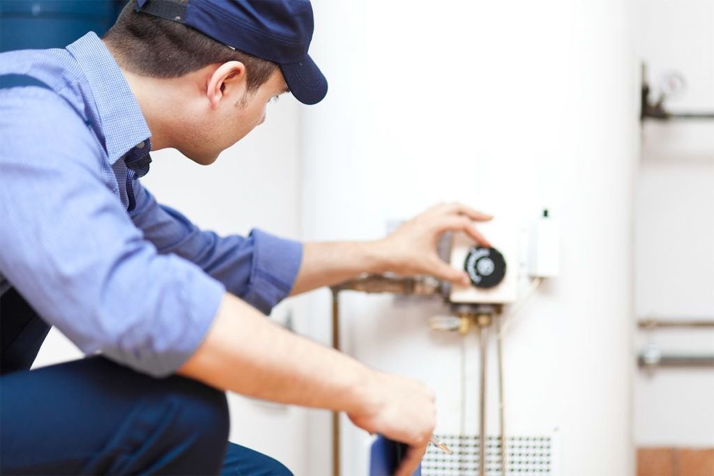 plumber-repairing-a-water-boiler-in-chicagoland